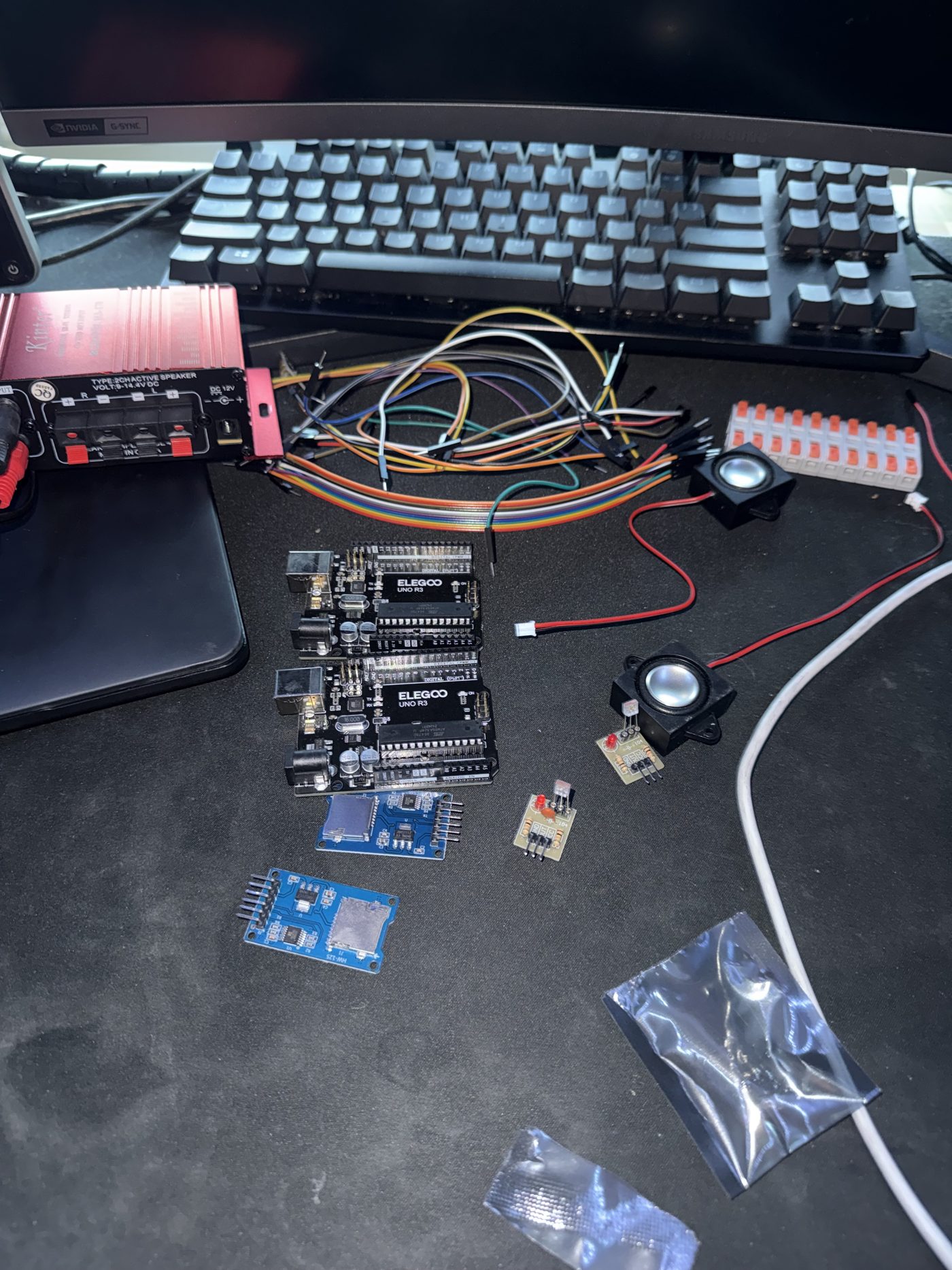 Breadboard prototype with Arduino, wiring, and laser module