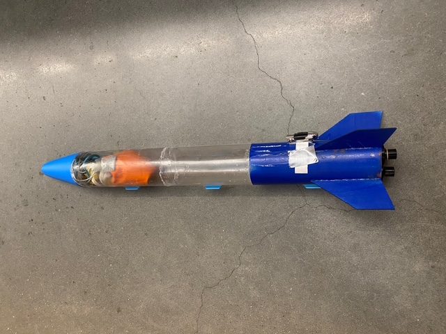 Finished rocket with clear payload bay and fins